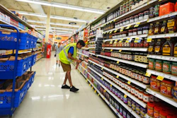 A personal shopper gathers items to fill an online grocery order in Dallas, Thursday, Aug. 28, 2025.