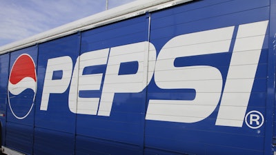 In this May 30, 2012, file photo, a Pepsi logo is seen on a delivery truck in Springfield, Ill.