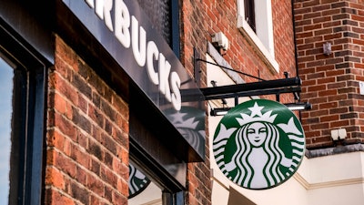 Starbucks logo outside a shop.