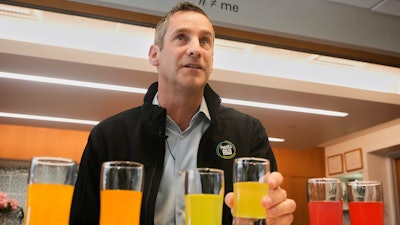 Damien Browne, vice president of research and development for PepsiCo's beverages, tastes a beverage at the company's R&D campus in Valhalla, N.Y., Sept. 19, 2025.