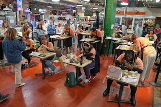 Contestants work on their entries in Scrapple Sculpting Contest at the Reading Terminal Market in Philadelphia, Friday, Oct. 10, 2025.