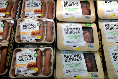 Packages of Beyond Meat's Beyond Burgers and Beyond Sausage, are shown in this photo, in New York, April 29, 2021.