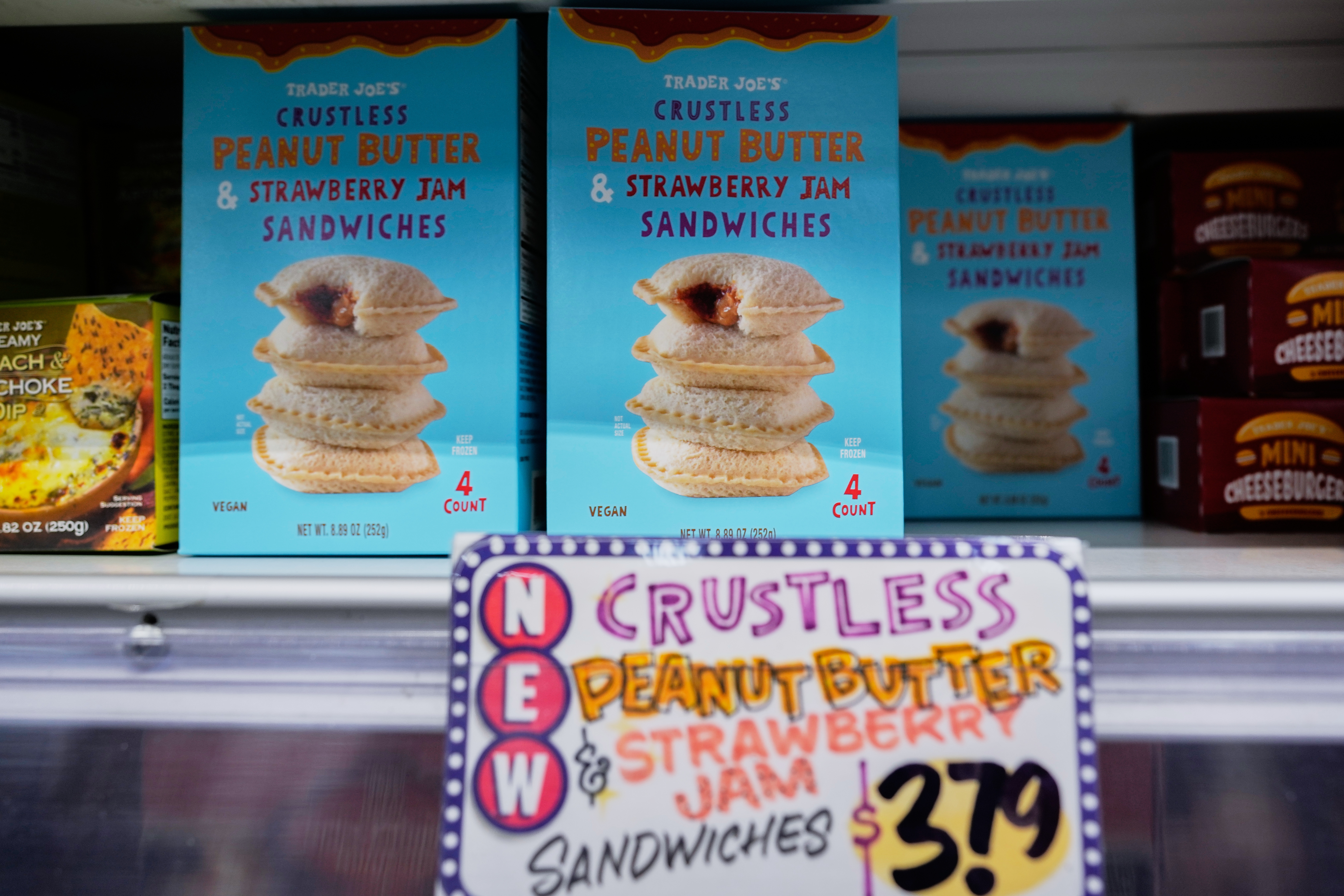 Crust-less sandwiches are displayed on shelf at a Trader Joe's grocery story in Royal Oak, Mich., Wednesday, Oct. 15, 2025.