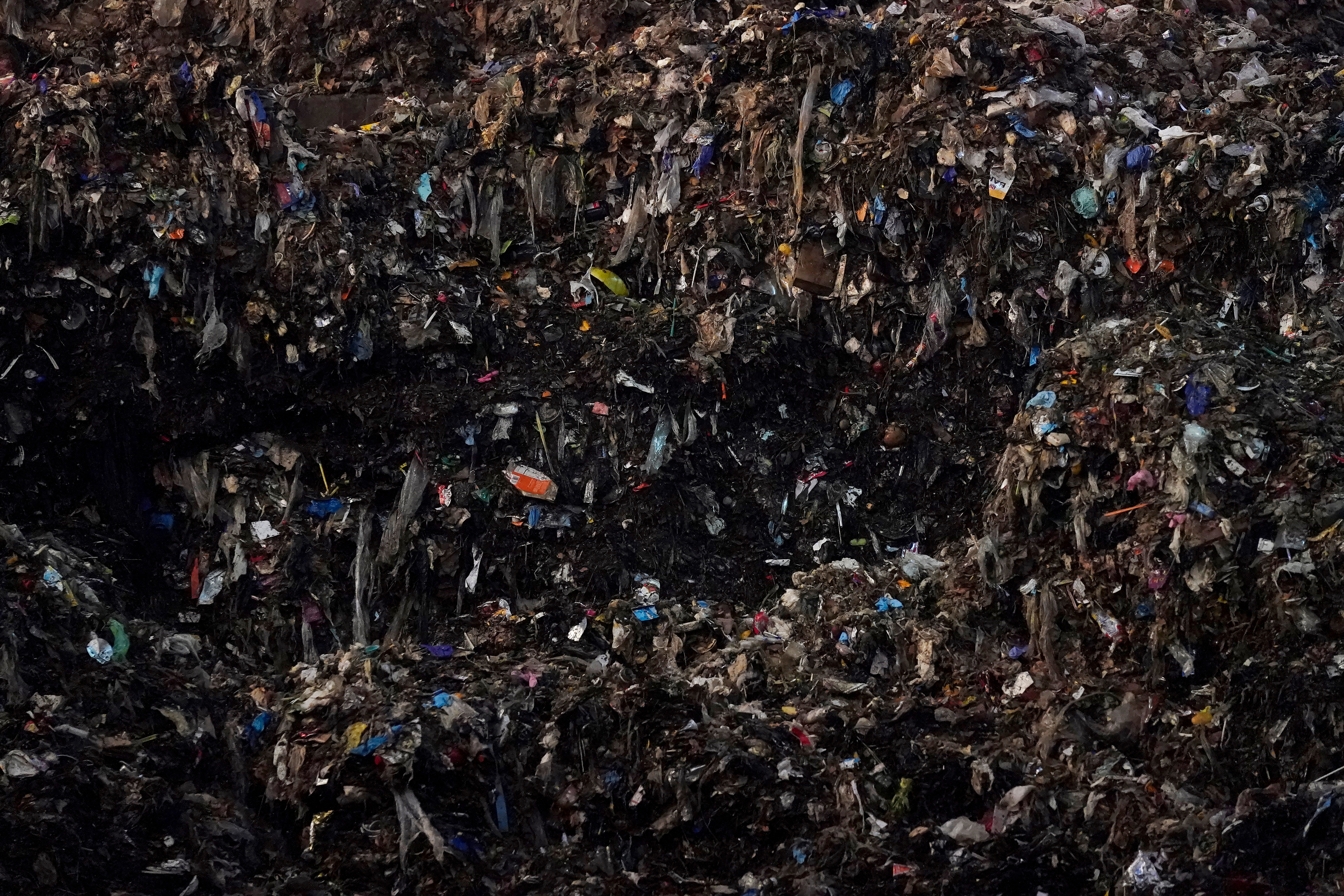 Shredded organic materials are piled up at a GreenWaste Renewable Energy Digestion Facility in San Jose, Calif., Oct. 27, 2023.