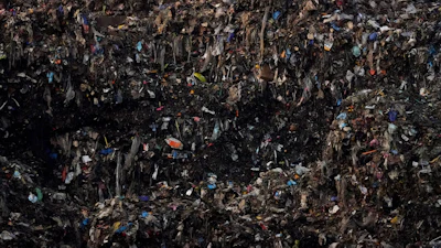 Shredded organic materials are piled up at a GreenWaste Renewable Energy Digestion Facility in San Jose, Calif., Oct. 27, 2023.