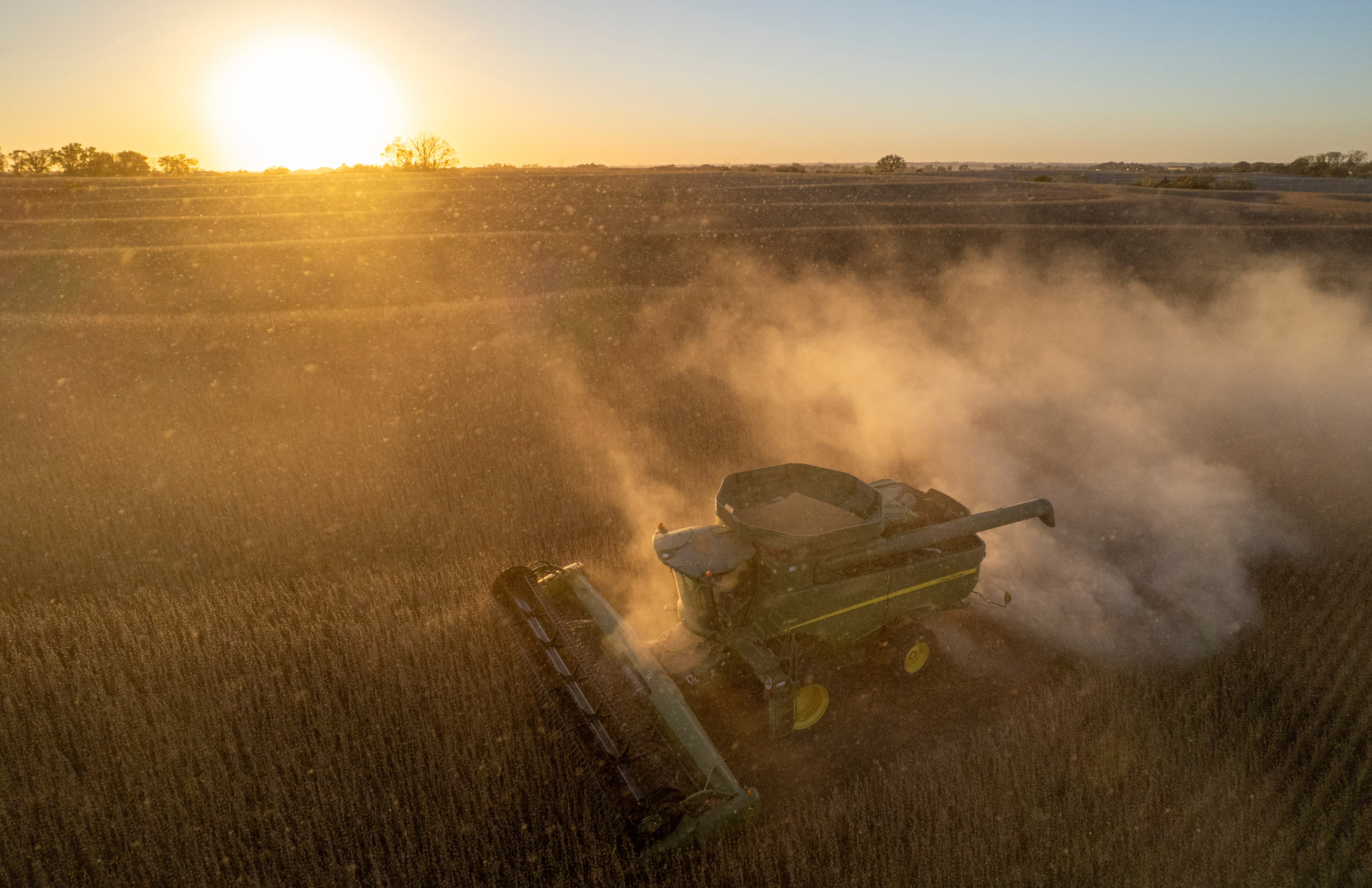 Rodney Egger harvests soybeans with a combine on Wednesday, Oct. 22, 2025, south of Lincoln, Neb.