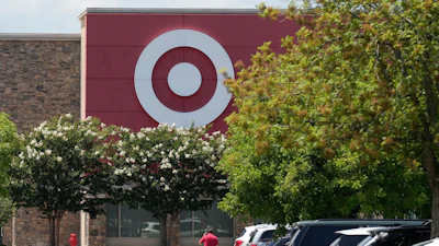 A person walks towards a Target store, July 15, 2025, in Nashville, Tenn.