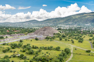 Aerial view of the Teotihuacan pyramids and greenery.