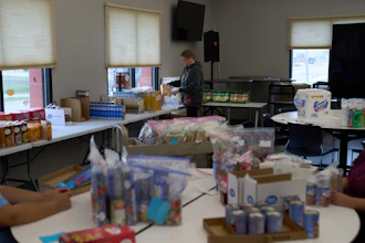 Jen Janecek Hartman helps prepare bagged meals for a food bank for students at Nueta Hidatsa Sahnish College, Thursday, Oct. 30, 2025, in New Town, N.D.