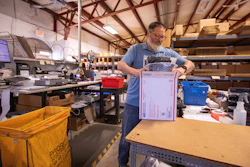 Terry Precision Cycling warehouse manager Luke Tremble packs orders at the company’s warehouse in Burlington, Vt., Oct. 28, 2025.