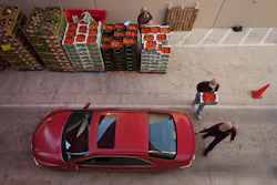 Volunteers help load vehicles during a food distribution at the San Antonio Food Bank for SNAP recipients and other households affected by the federal shutdown, Thursday, Nov. 6, 2025, in San Antonio.