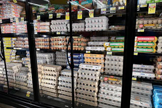 Eggs are displayed in refrigerators at a grocery store in Glenview, Ill., Feb. 10, 2025.