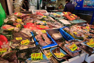 In this March 23, 2011, file photo, various types of fish are sold at a shop near the Tsukiji Fish Market in Tokyo.