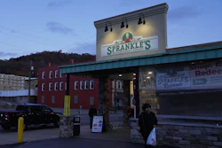 People leave Sprankle's Neighborhood Market, Monday, Nov. 10, 2025, in Kittanning, Pa.