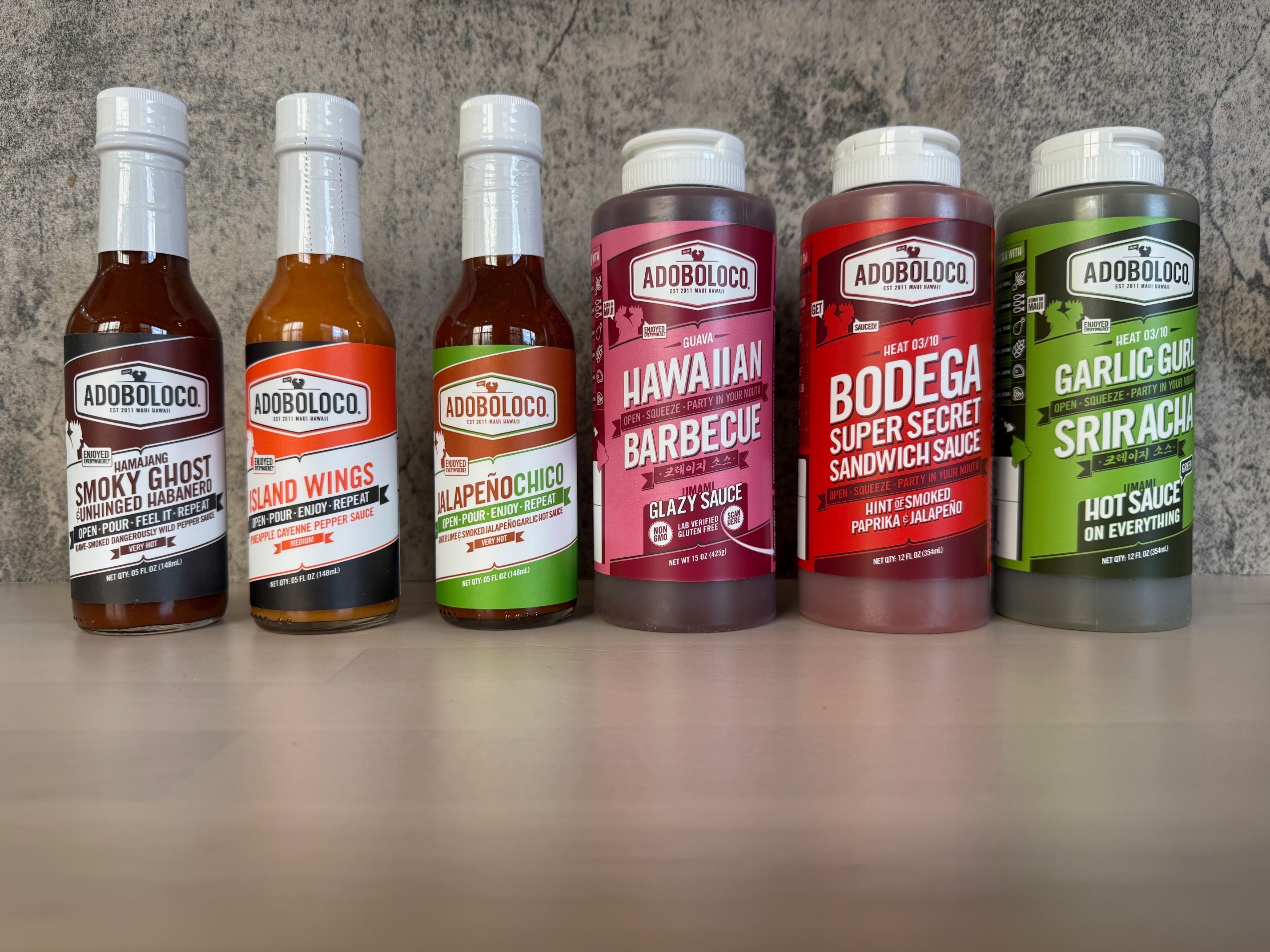A variety of Adoboloco sauces from Hawaii's island of Maui are displayed in New York.