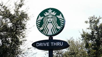 A Starbucks sign is seen on, Jan. 16, 2025, in Houston.