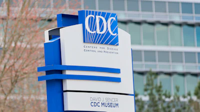 A sign with the CDC logo is displayed at the entrance to the agency's headquarters in Atlanta on March 2, 2025.