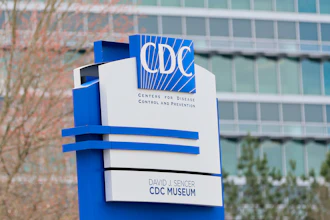 A sign with the CDC logo is displayed at the entrance to the agency's headquarters in Atlanta on March 2, 2025.