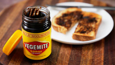 A piece of toast is prepared with Vegemite in Sydney, Australia, Nov. 17, 2025.