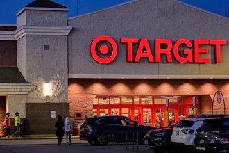 Shoppers walk towards a Target retail store, Tuesday, Nov. 18, 2025, in Salem, N.H.