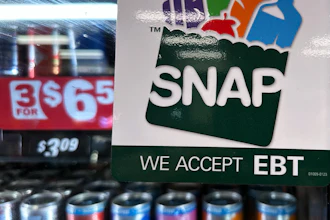 A SNAP EBT information sign is displayed at a gas station in Riverwoods, Ill., Nov. 1, 2025.