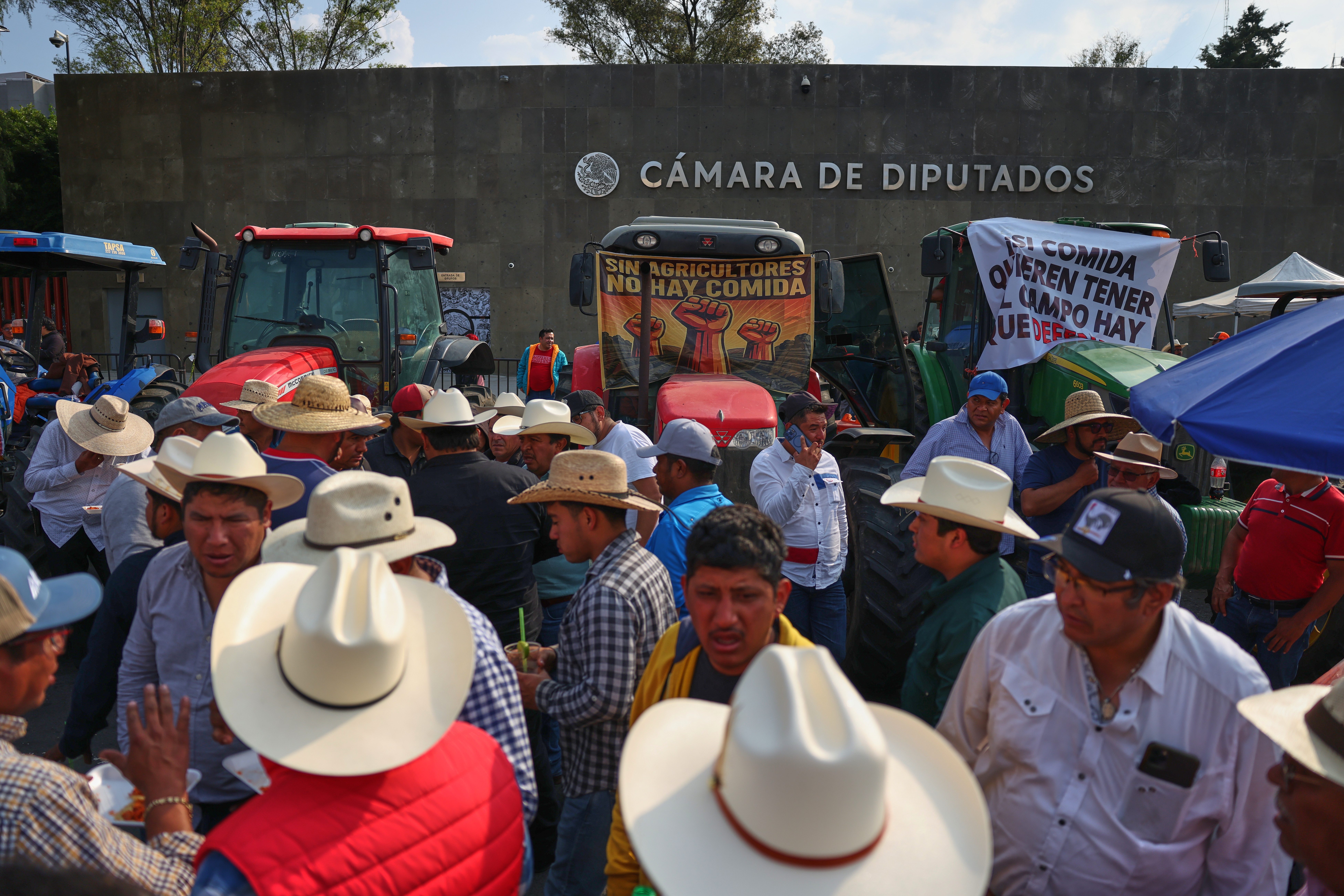 Farmers protest a proposed water law outside the Chamber of Deputies in Mexico City, Wednesday, Dec. 3, 2025.