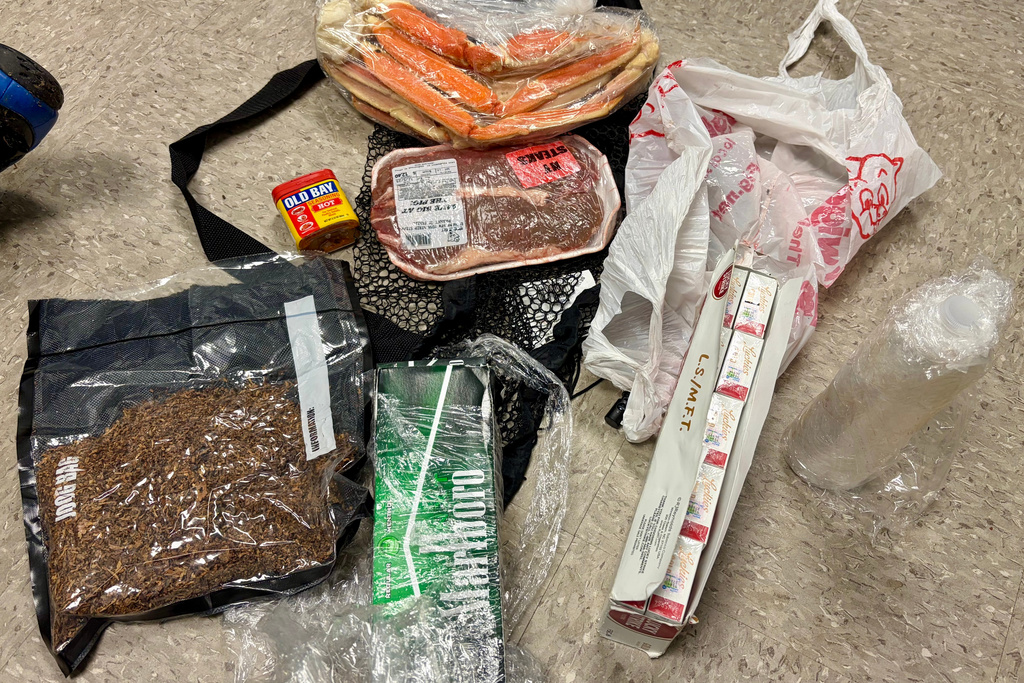 In this undated photo released by the South Carolina Department of Corrections, items dropped by a drone into the Lee Correctional Institution in Bishopville, S.C., are seen.