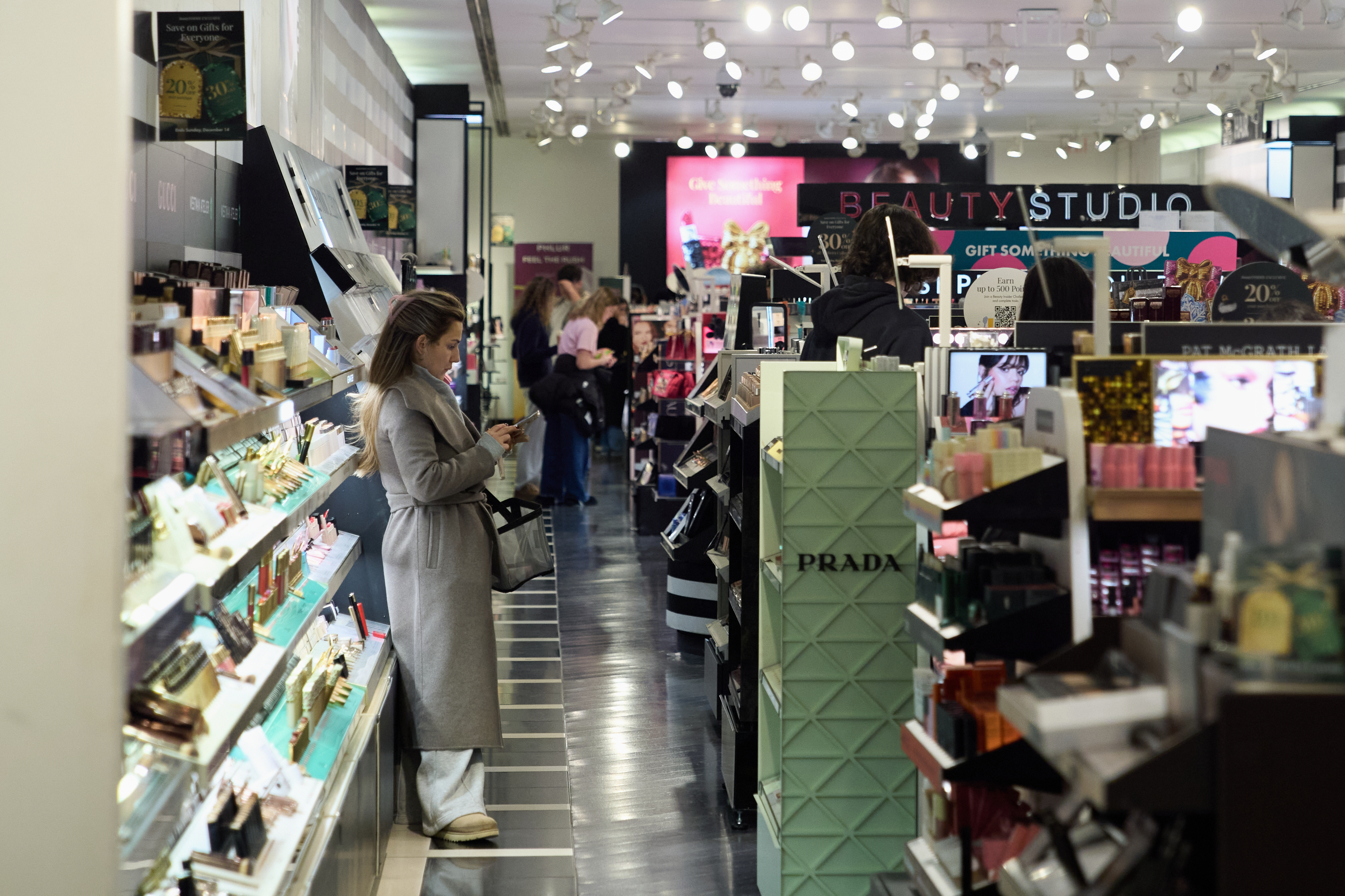 People shop at the Somerset Collection mall, Wednesday, Dec. 10, 2025, in Troy, Mich.