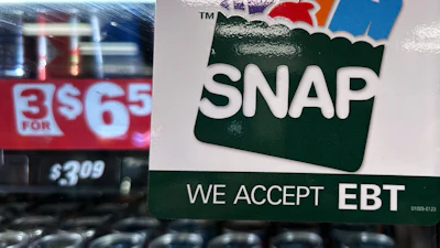 SNAP EBT information sign is displayed at a gas station in Riverwoods, Ill., Saturday, Nov. 1, 2025.