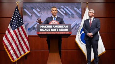Transportation Secretary Sean Duffy speaks alongside Derek Barrs, administrator of the Federal Motor Carrier Safety Administration, during a news conference in Washington, Dec. 12, 2025.