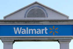 In this Tuesday, Sept. 3, 2019, file photo, a Walmart logo forms part of a sign outside a Walmart store, in Walpole, Mass.