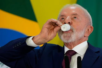 Brazilian President Luiz Inacio Lula da Silva takes a sip of coffee during a year-end press conference at Planalto presidential palace in Brasilia, Dec. 18, 2025.