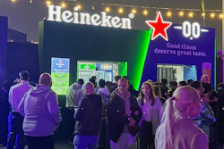 Festivalgoers gather near food and beverage stands, including a booth serving nonalcoholic beer, during the Soundstorm music festival in Riyadh, Saudi Arabia, Dec. 11, 2025.