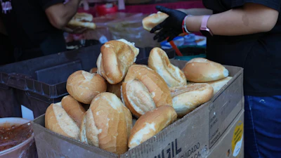 Bolillos, a traditional Mexican bread, sit for sale at a street stand in Mexico City, Dec. 18, 2025.