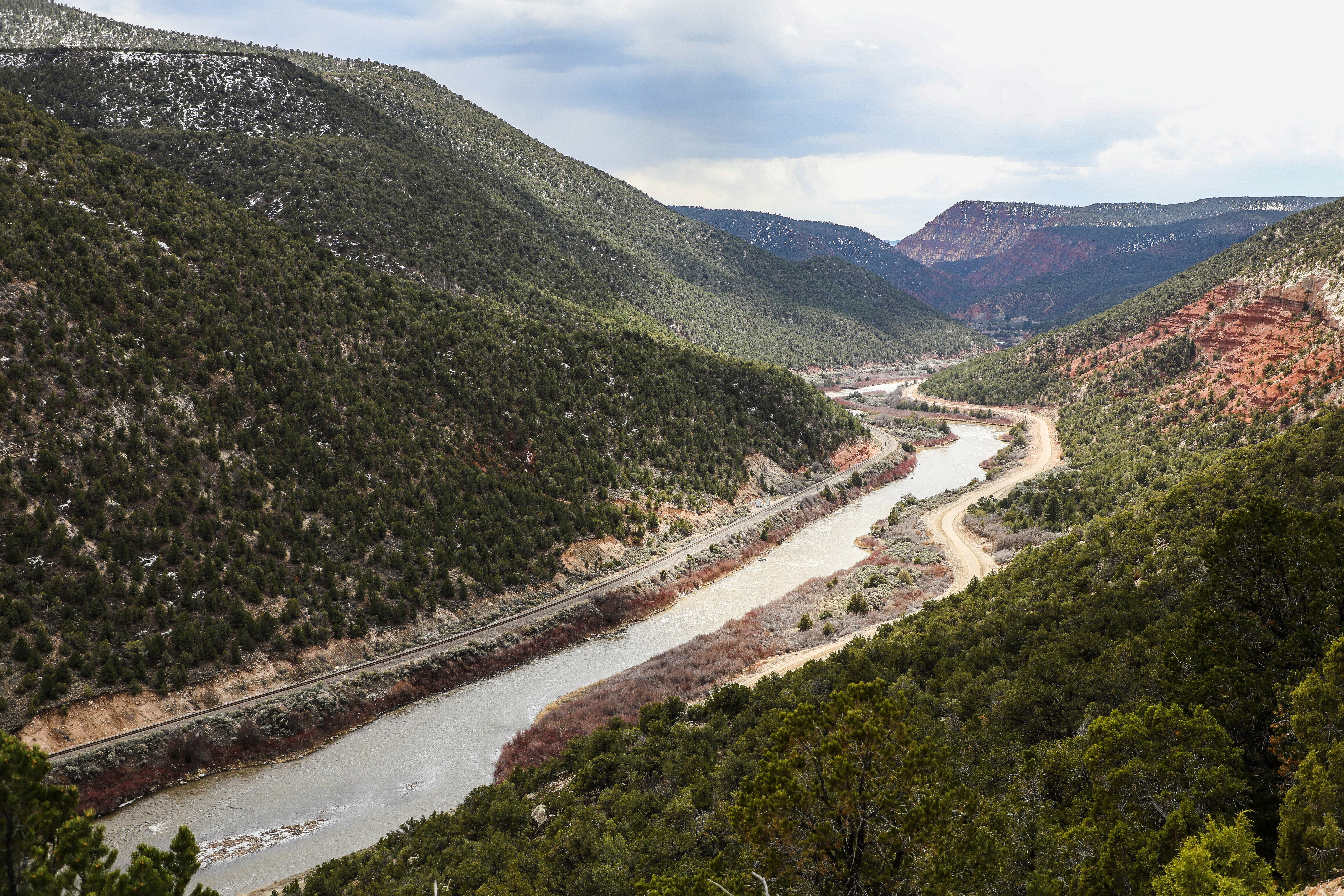 The Colorado River runs through mountains near Burns, Colo., on April 12, 2023.