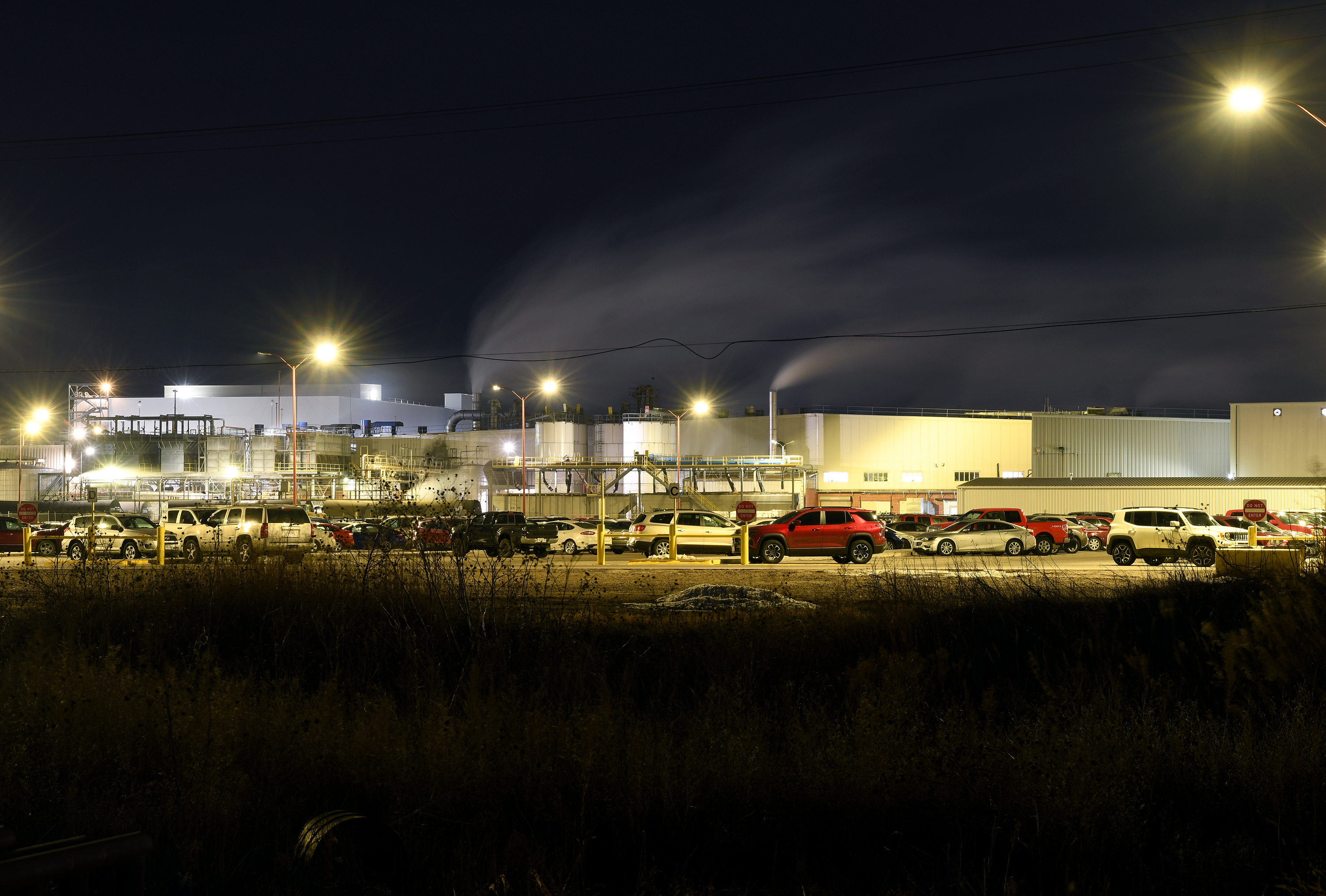 Steam rises from chimneys during the night shift at the Tyson Foods' beef plant in Lexington, Neb., Dec. 3, 2025.