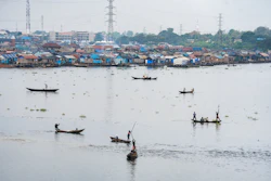 Fishermen in the lagoon in Lagos, Nigeria, Dec. 6, 2025.
