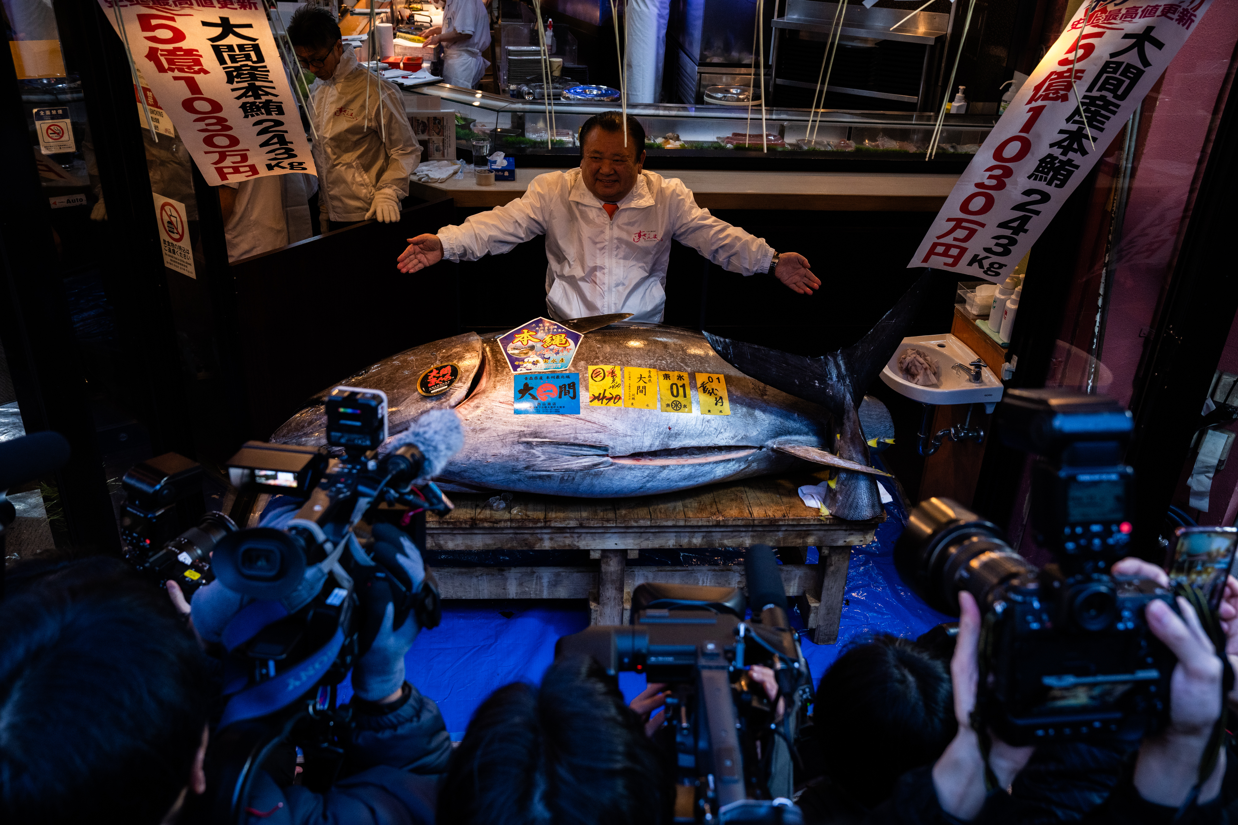Kiyoshi Kimura, president of Kiyomura Co., poses with the bluefin tuna that won the highest bid at the annual New Year auction in Tokyo, Jan. 5, 2026.