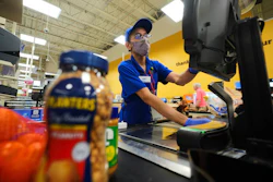 A cashier rings up groceries in Dallas, Aug. 28, 2025.