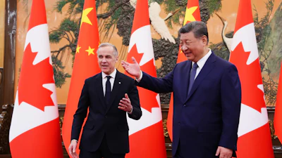 Canadian Prime Minister Mark Carney, left, meets with President of China Xi Jinping at the Great Hall of the People in Beijing, Jan. 16, 2026.