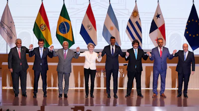 Leaders from Mercosur and EU nations pose for a group photo during a meeting to sign a free trade deal, Asuncion, Paraguay, Jan. 17, 2026.