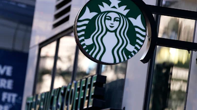 The 'Siren' logo hangs outside a Starbucks Coffee shop, July 14, 2021, Boston.
