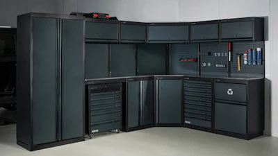 Dark gray modular garage storage system with tool drawers and wall panels