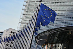 European Union flags outside of EU headquarters in Brussels, Nov. 4, 2025.