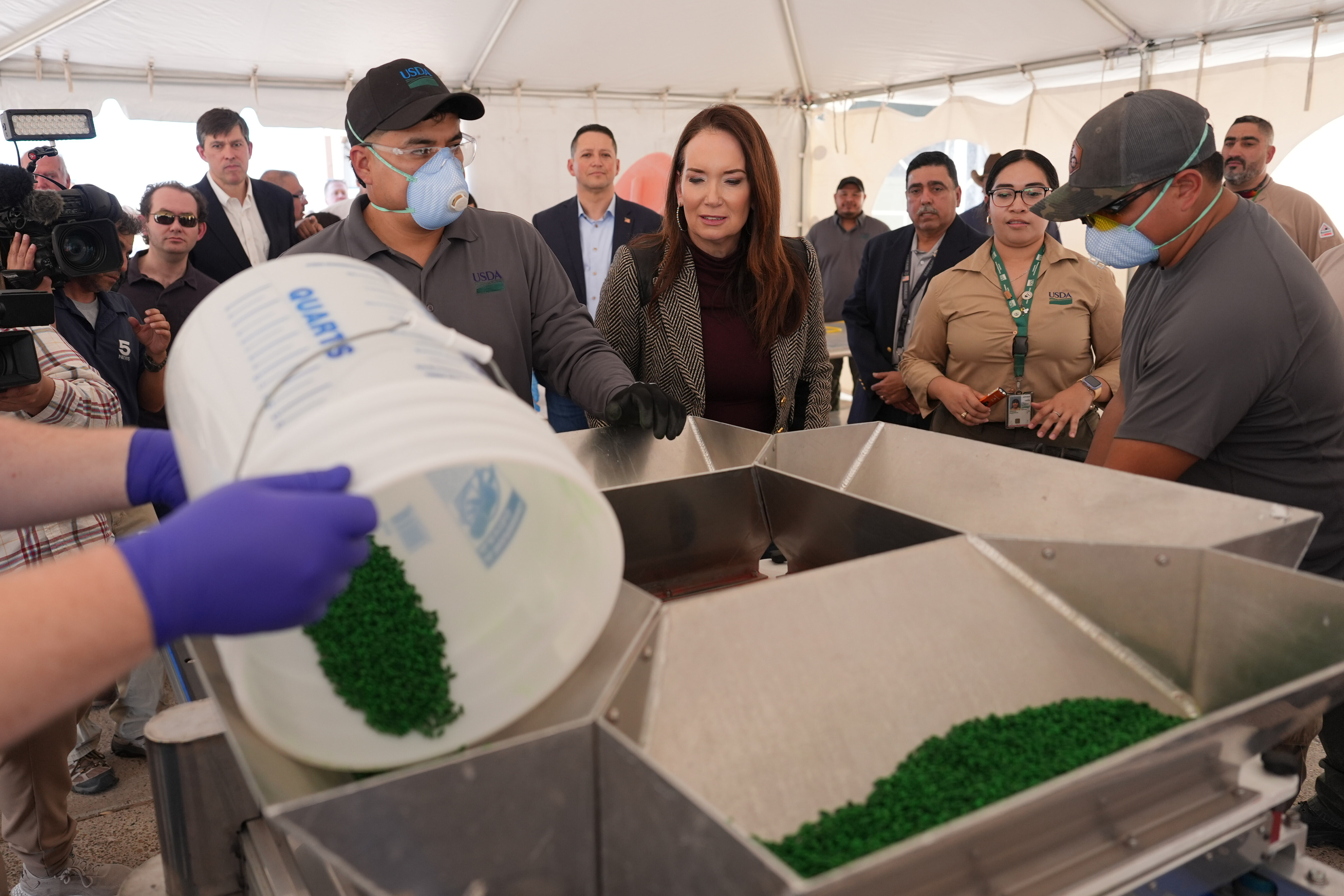 U.S. Secretary of Agriculture Brooke Rollins, center, at the grand opening of a Domestic New World Screwworm Sterile Fly Production Facility, Edinburg, Texas, Feb. 9, 2026.