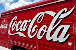 The Coca-Cola logo on the side of a delivery truck, May 15, 2024, Denver.