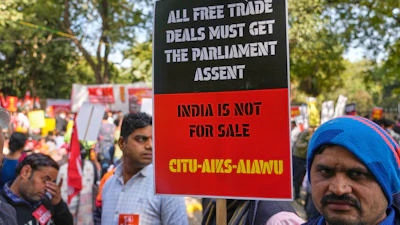 Members of trade unions hold banners during a nationwide strike, New Delhi, India, Feb. 12, 2026.