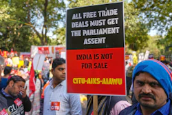 Members of trade unions hold banners during a nationwide strike, New Delhi, India, Feb. 12, 2026.