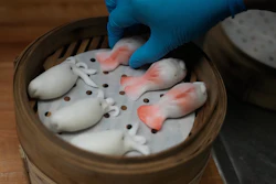 A kitchen worker prepares dumplings at the Empress by Boon restaurant in San Francisco, Jan. 8, 2026.