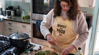 Mara Fleishman, CEO of the Chef Ann Foundation, chops apples for a salad at her home, Feb. 16, 2026, Boulder, Colo.